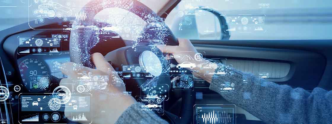 digital images over hands on a steering wheel